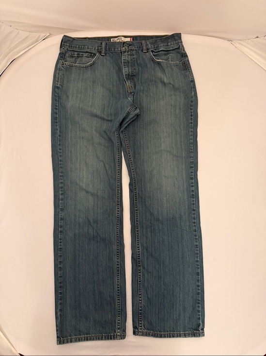 Levi's Other - Levi’s Relaxed and Straight 559 slightly distressed blue denim jeans 35x34